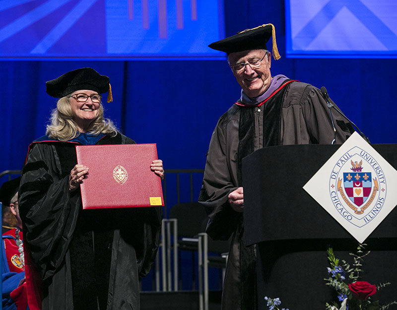 Nancy Hill, professor, receives a Via Sapientiae Award.